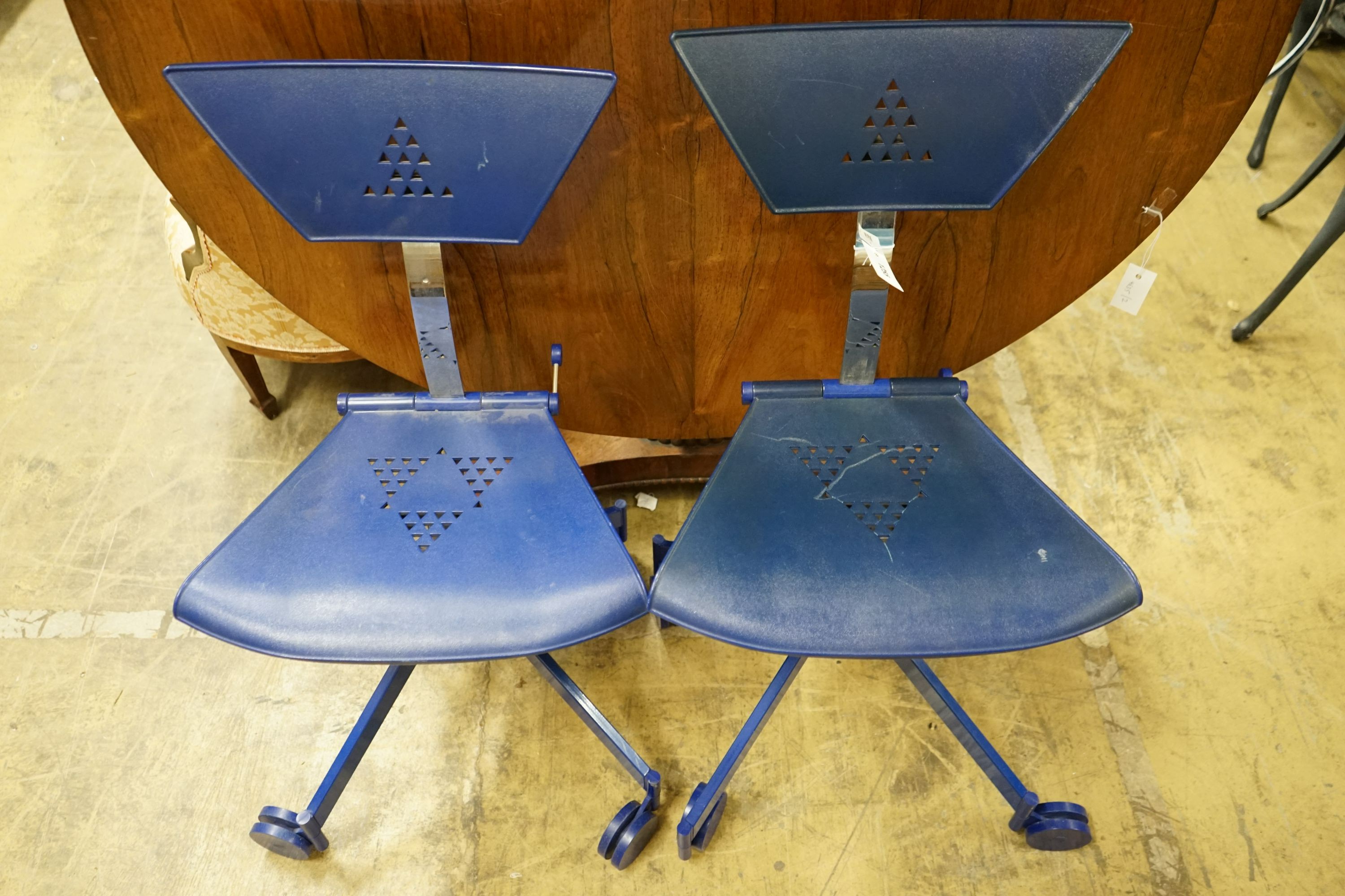 A pair of Italian Marc Berthier Magis chairs, height 92cm